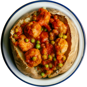Meatballs with tomato and peas