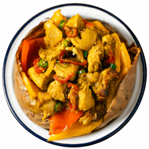 Pollo Thai con latte di cocco, peperoni, zenzero, cipolla, coriandolo, lime e peperoncino