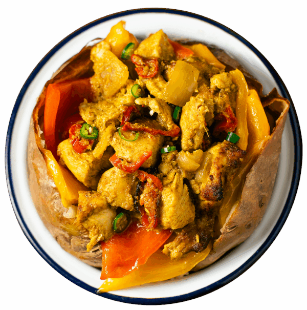 Pollo Thai con latte di cocco, peperoni, zenzero, cipolla, coriandolo, lime e peperoncino